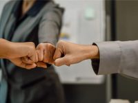 Business-colleagues-giving-fist-bump